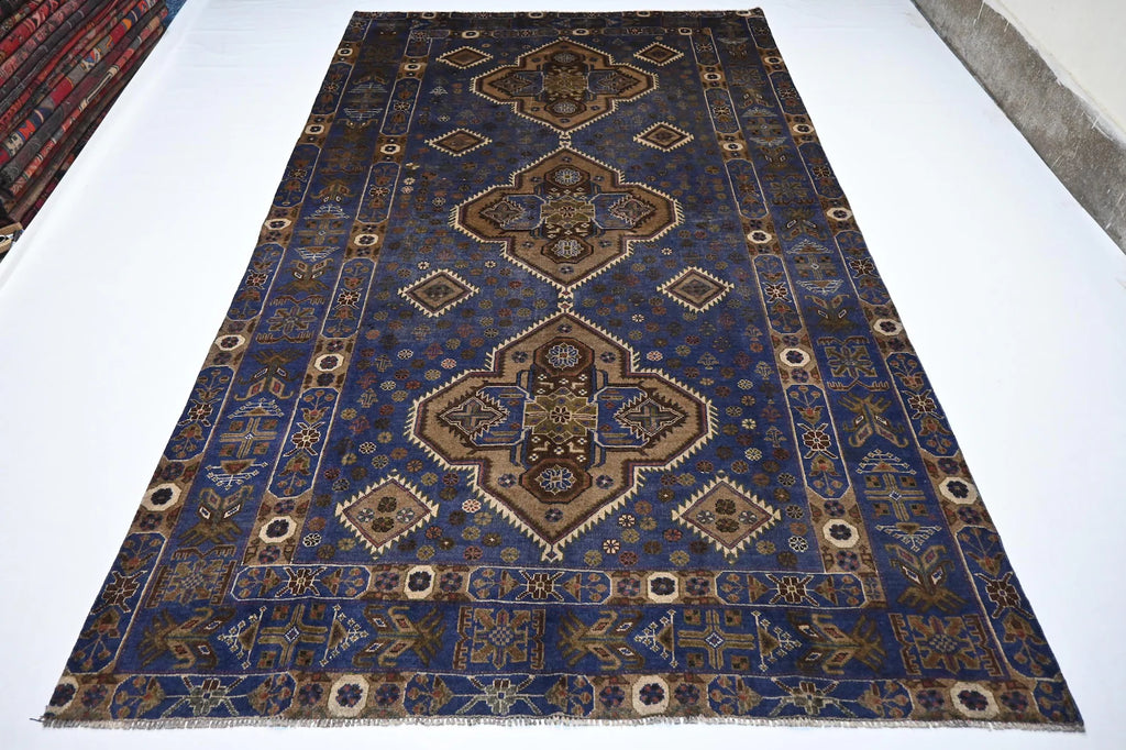 Azmir 5’10” × 9’9”