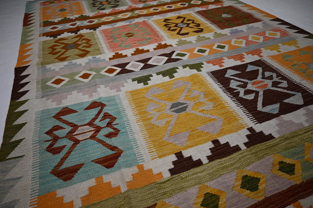 Exquisite Handmade Afghan Kilim Rug: 6x9 Geometric Wool Flatweave for Your Home