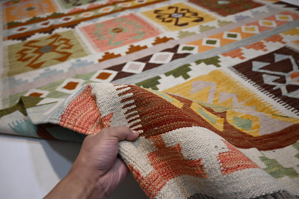 Exquisite Handmade Afghan Kilim Rug: 6x9 Geometric Wool Flatweave for Your Home