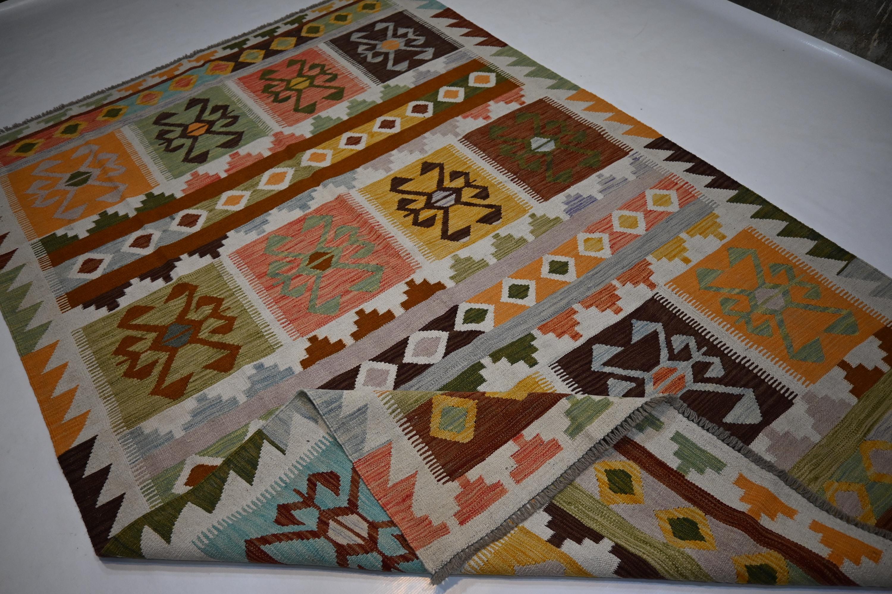 Exquisite Handmade Afghan Kilim Rug: 6x9 Geometric Wool Flatweave for Your Home
